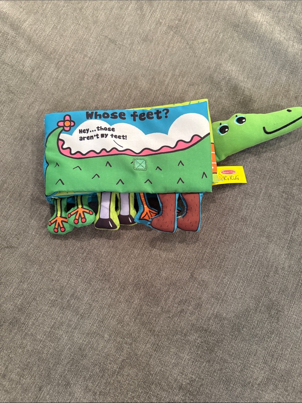 Melissa & Doug Green Plush Interactive 'Whose Feet?' Activity Book
